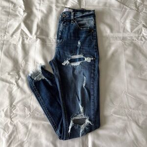 Medium Wash High Rise Distressed Ankle Jeggings